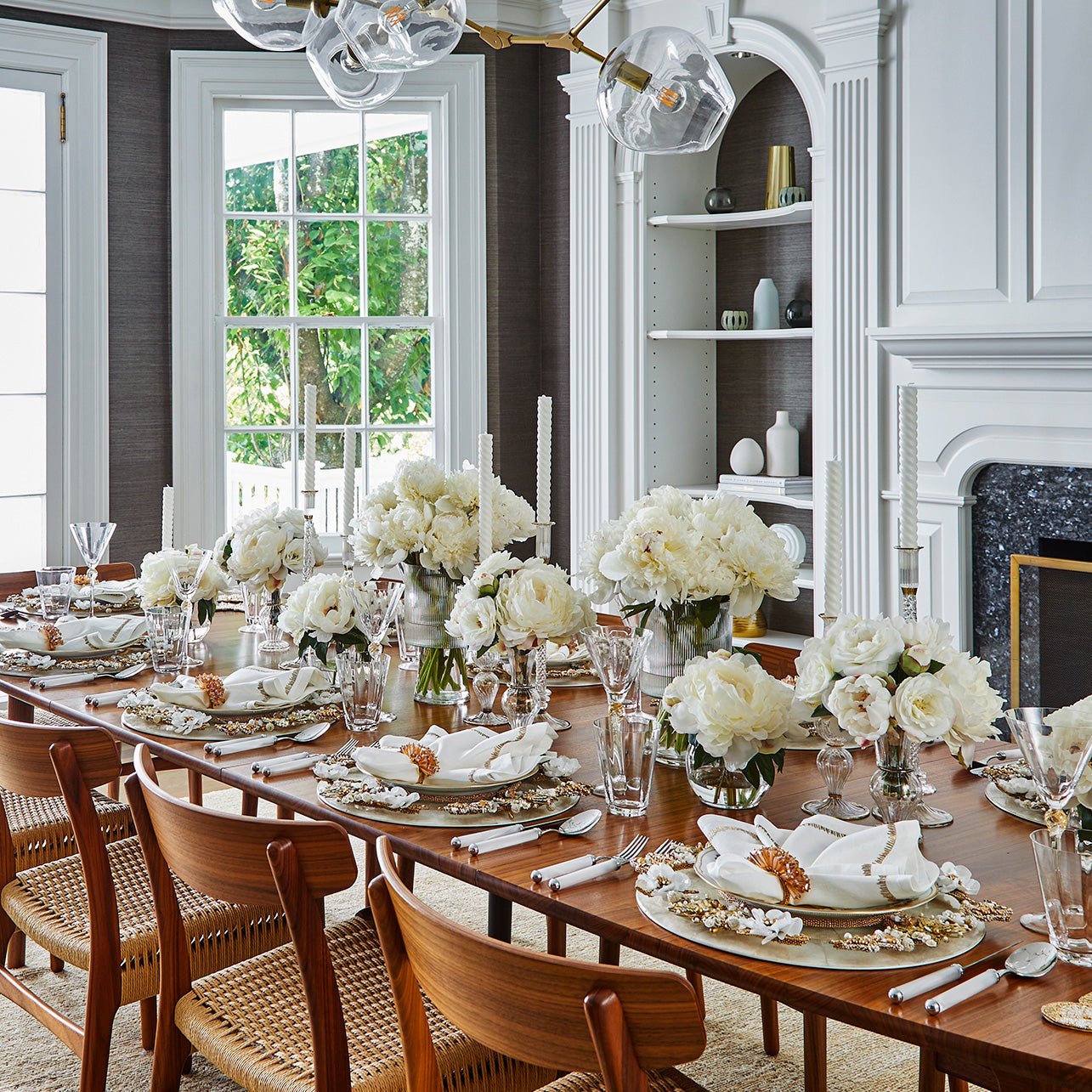 Elegant bridal shower table setting with white flowers